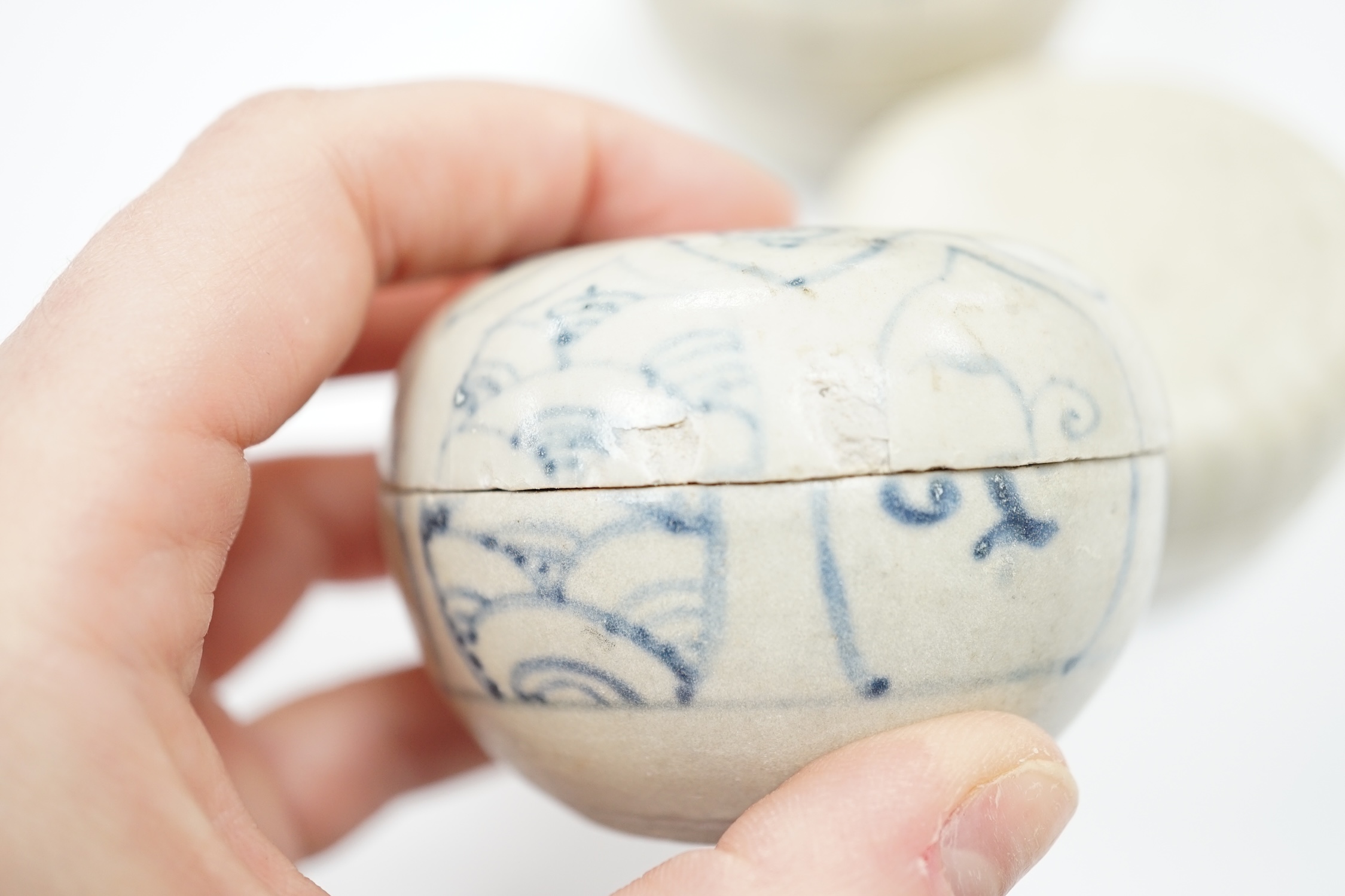 Two Annamese Chinese blue and white boxes and covers, 15th/16th century and a Dehua moulded box and cover, Ming dynasty